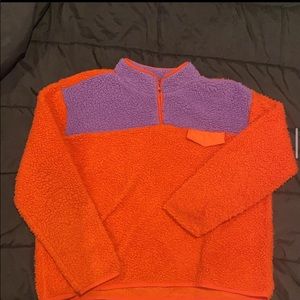 orange and purple sweater